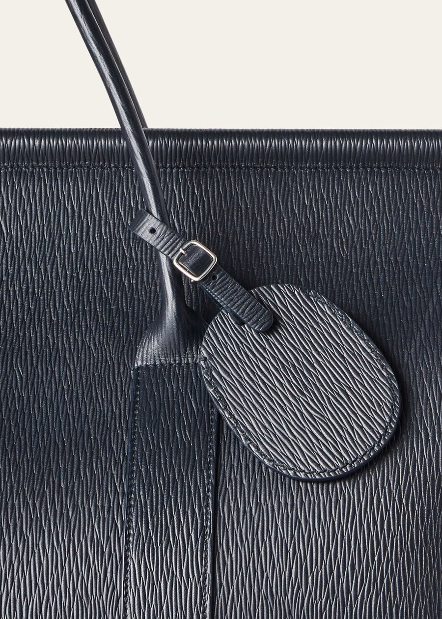 Oval luggage tag in navy blue/onyx calfskin
